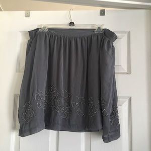 Silky skirt with sequencing.